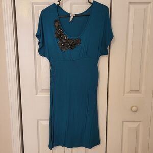 Charming Charlie teal short sleeve dress with black beaded design around neck